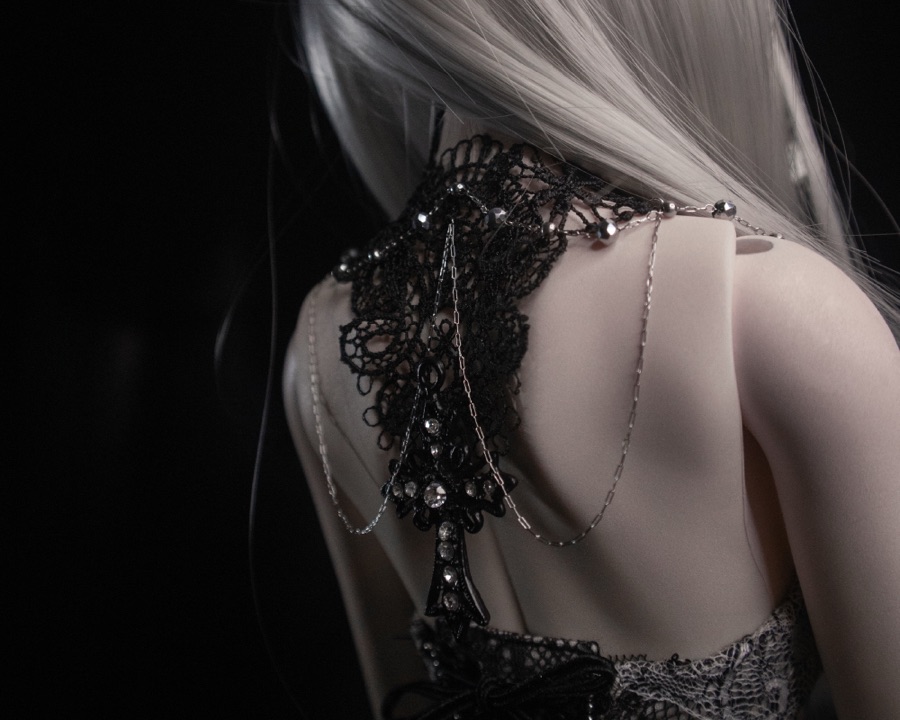 Beaded bodice and chain detail from behind