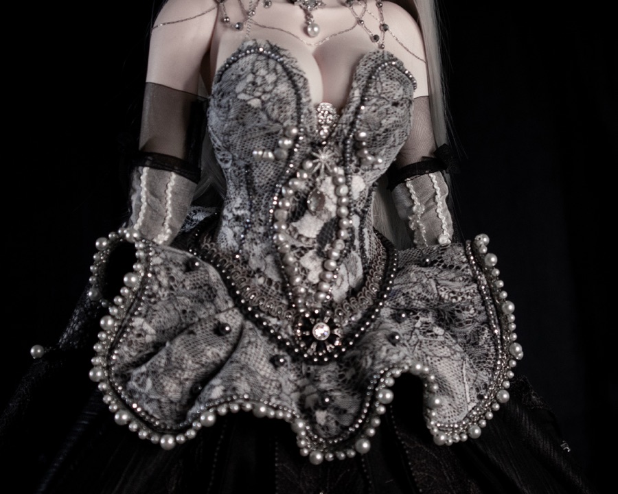 Silver beaded corset, close up