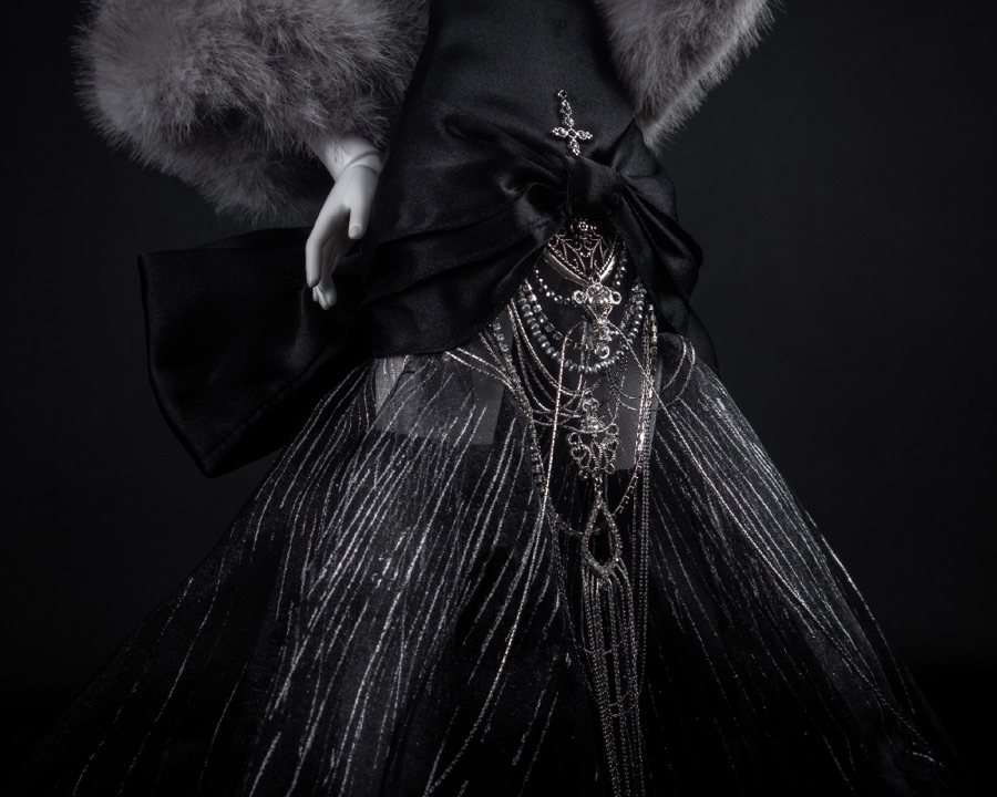 Black gown with fur stole and chain